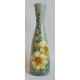Vase décoratif fleurs jaunes sur fond gris