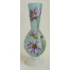 Vase décoratif fleurs mauves 